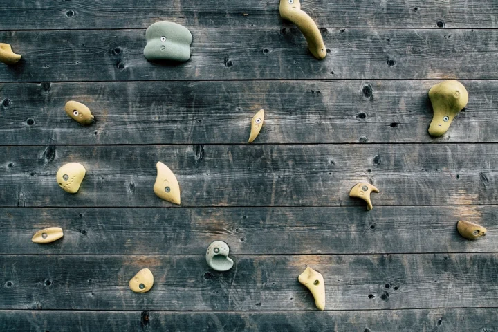 Rock Climbing and Bouldering for Beginners: Building Strength Through Grip and Problem-Solving